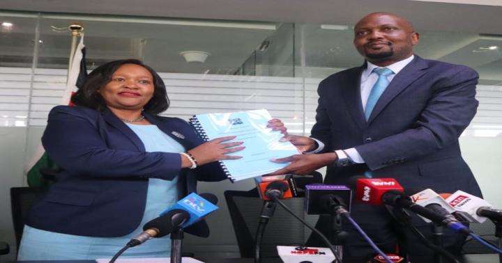 Cabinet Secretary FCS Rebecca Miano, MBS receive hand-over notes from the  outgoing CS Moses Kuria.